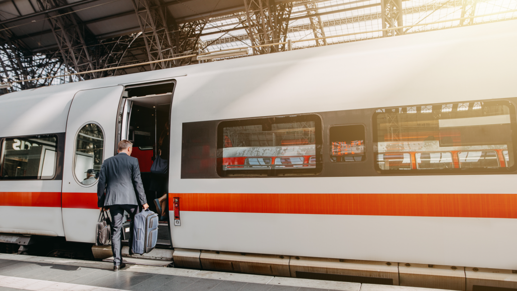 Business man boarding train